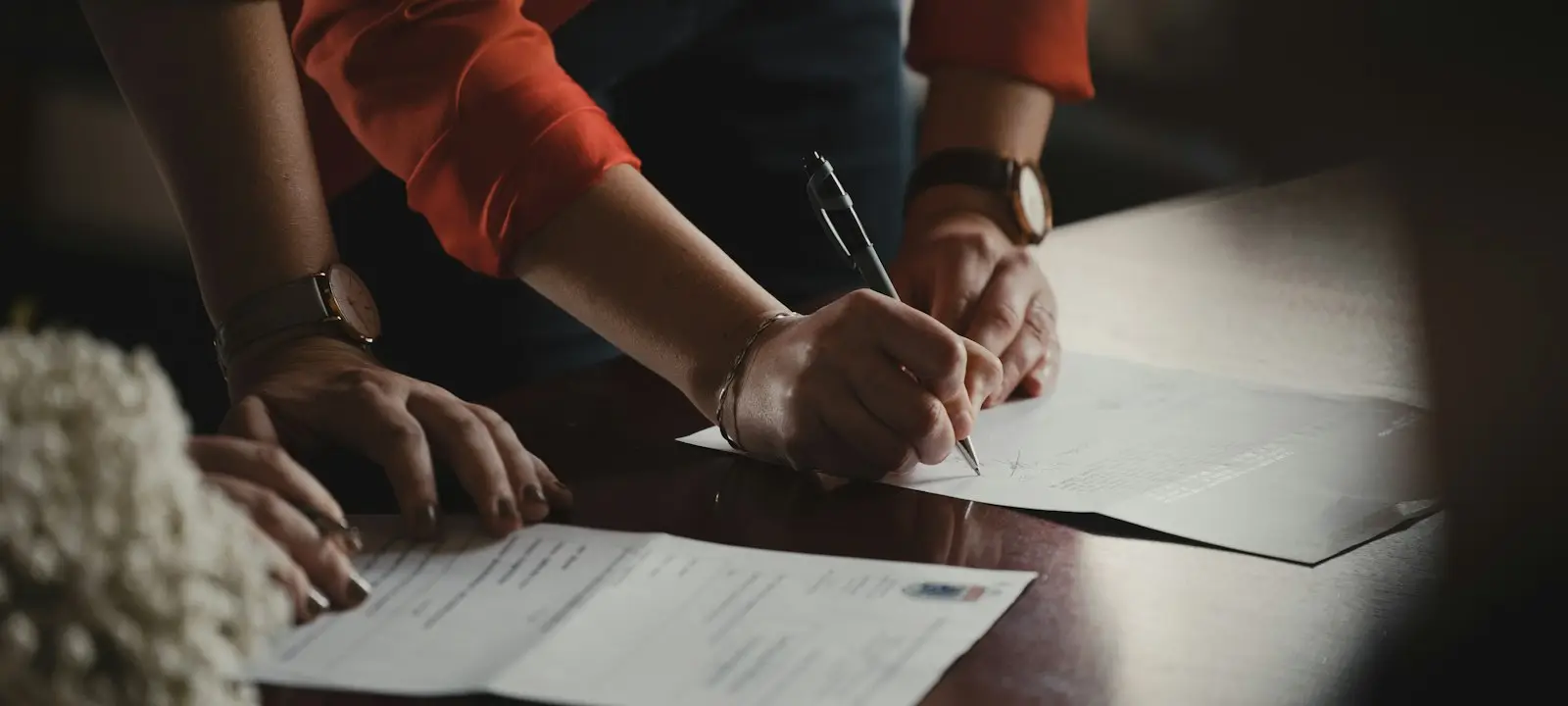 Person signing management documents